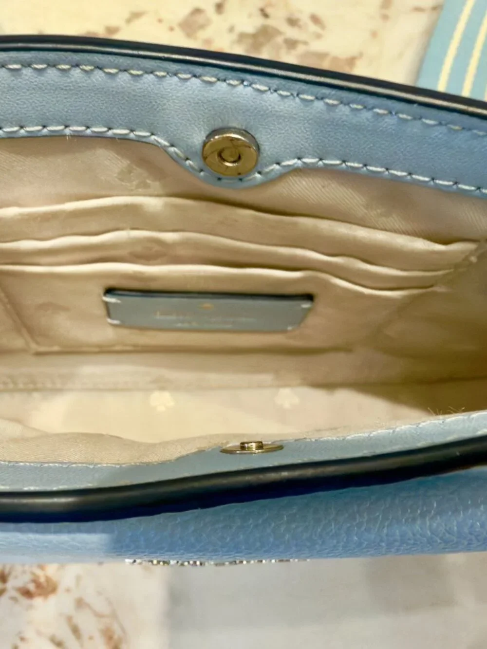 Kate Spade New York crossbody bag in light blue with coin pouch